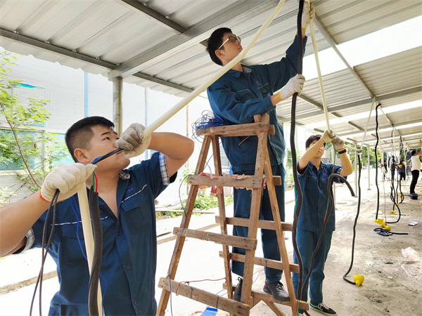 修建車棚解難題 新人支援效率高1采用.jpg 修建車棚解難題 新人支援效率高1采用.jpg